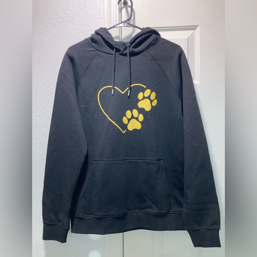 Black hoodie with yellow heart and dog paws. Size medium